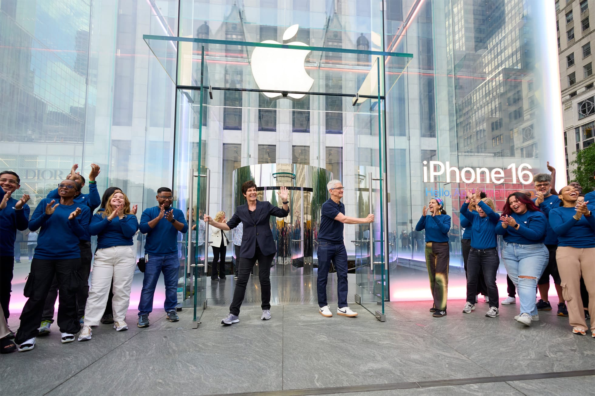 A person holding a blue iPhone in their hand