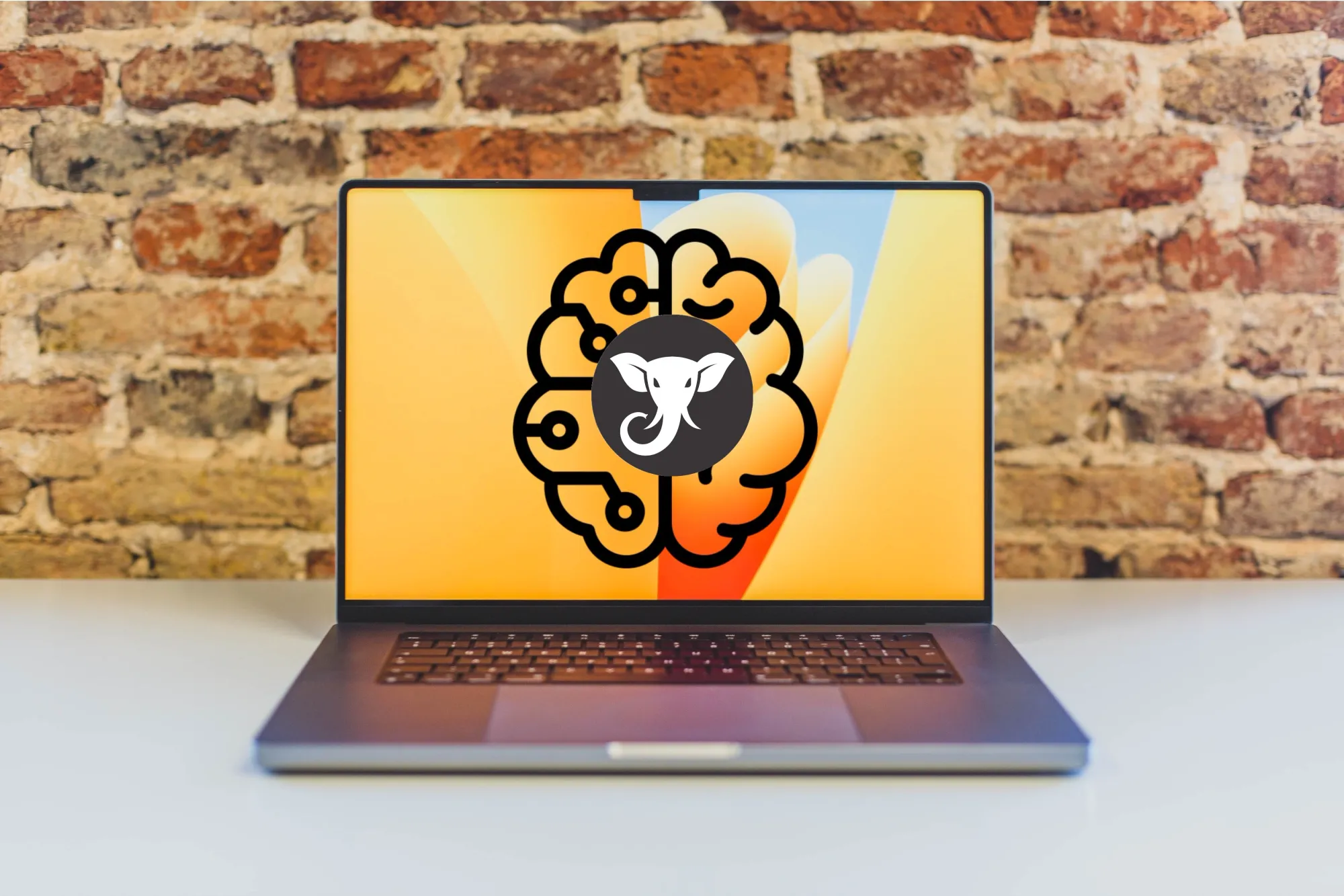 Imagem de um MacBook Pro de 16 polegadas com o logo de um cérebro e o logo do Elephas